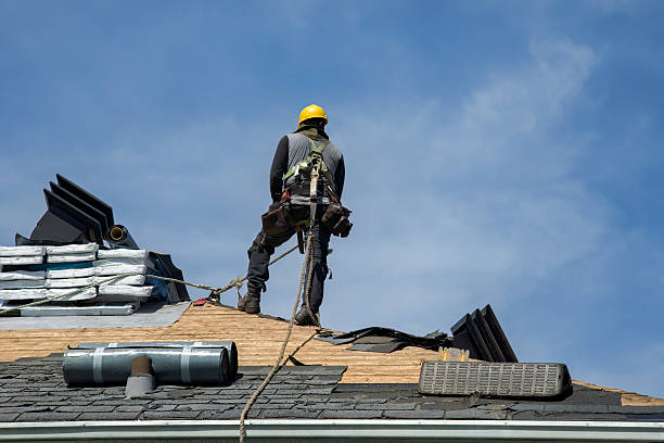 Professional Storm Damage Roof Repair technician working in Clymer, PA